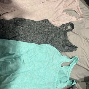 3 Under Armour women’s size L tank tops